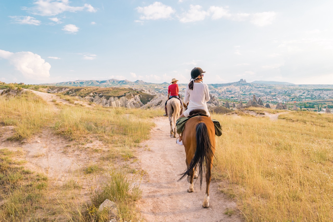 horse riding Cappadocia, woman horse riding Kapadokya Turkey